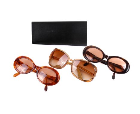 Three pairs of designer prescription sunglasses and a Fendi sunglasses case. Comprising a pair of Tom Ford 'Genevieve' sungla