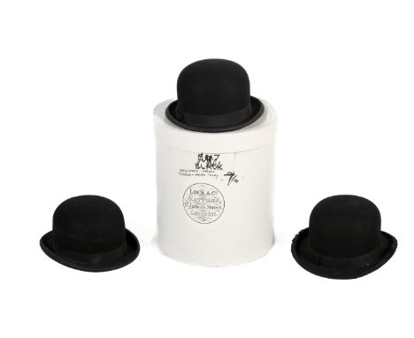 Three gentleman's vintage black felt bowler hats. Comprising one by Dunn & Co Ltd, having a leather band and cream satin lini