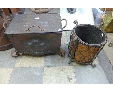 An Art Nouveau copper and wrought iron log box and another