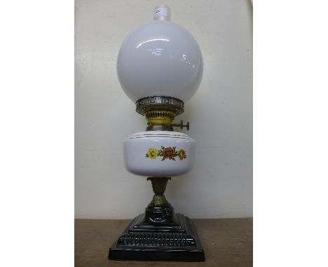 A Victorian style oil lamp