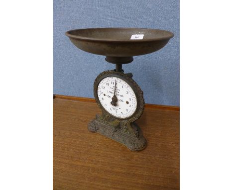 A set of early 20th Century Salters cast iron kitchen scales