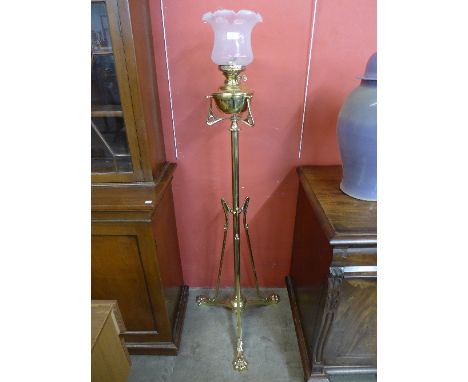 An Art Nouveau brass telescopic standard oil lamp