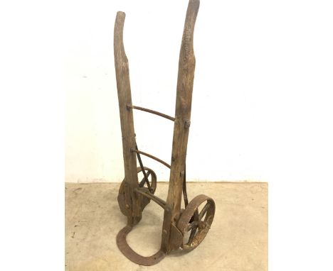Vintage sack trucks. Metal wheels and base with oak handles. C19th W:49cm x H:124cm
