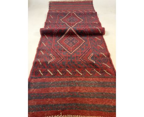 A Meshwani runner W:58cm x H:236cm
