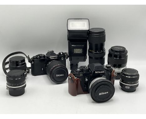 Two Nikon 35mm film SLR cameras, quantity of lenses and associated accessories. Nikon F3 SLR with DE-2 eye level finder, and 