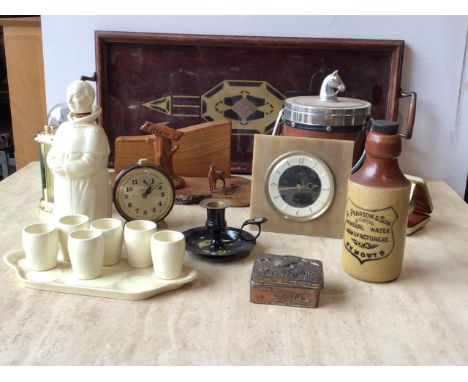 A mixed lot including a vintage wooden tray, ice bucket (horse interest), clocks,monk decanter and other items