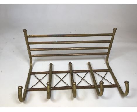 A vintage metal hat and coat wall rackW:56cm x D:28cm x H:21cm