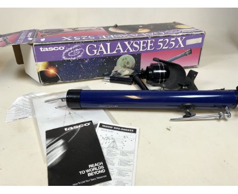 A Tasco Galaxsee 525x telescope. Untested. no tripod. (a.f)