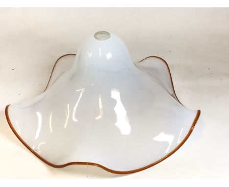 A large vintage milk glass Pendant Light shaped as a hat with orange fluted edge. Probably Italian W:60cm x H:30cm