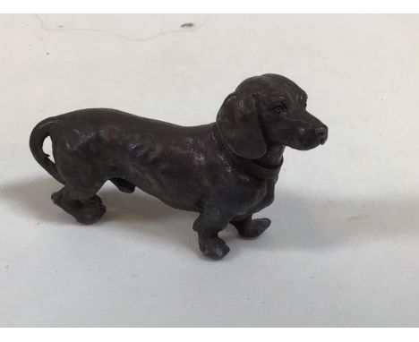 A miniature bronze Dachshund W:9cm x H:6cm