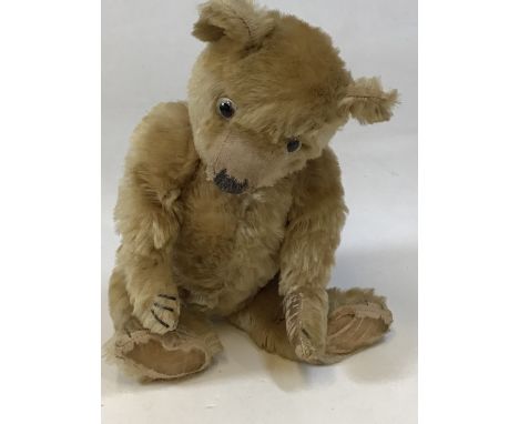 A vintage jointed teddy bear - no makers label H:37cm