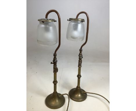 A near pair of copper and brass swan neck architectural style lamps with opaque glass shades H:51cm