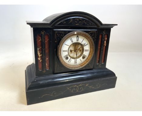 An early 20th century American slate mantle clock with dome top, marked Ansonia USA. Patented 1882. W:37cm x D:18cm x H:31cm