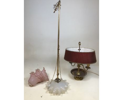 An early twentieth century opaque glass and brass ceiling light H:88cm also with a brass table lamp, pink glass shades also w