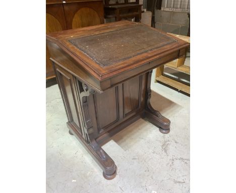 A Victorian style mahogany Davenport with Satin wood interior with leather writing slope. With interior drawers. With doors t