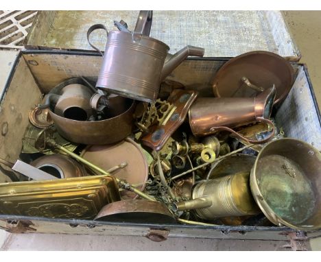 A large collection of brass and copper in vintage metal bound suitcase suitcase. 