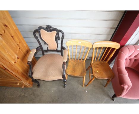 Two elm seated stick back chairs and a late Victorian elbow chair 