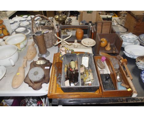 A collection of wooden items including clothes pegs, cutlery trays, a mauchlineware string box etc and  set of scales