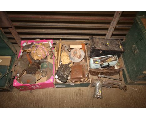 Three boxes containing a quantity of various metal ware to include a hanging oil lamp; a vintage grinding wheel; a wall mount