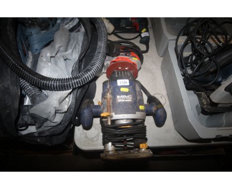 A Mac Allister MRO1200 router and a Black &amp; Decker KA270 orbital sander