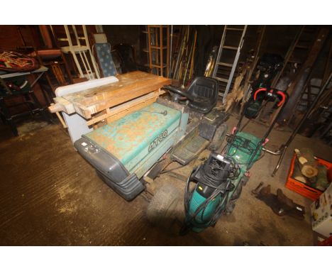 An Atco 12/36 ride on mower with key and instruction manual, AF 