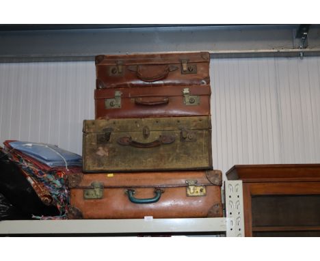 Four vintage suitcases, some initialled