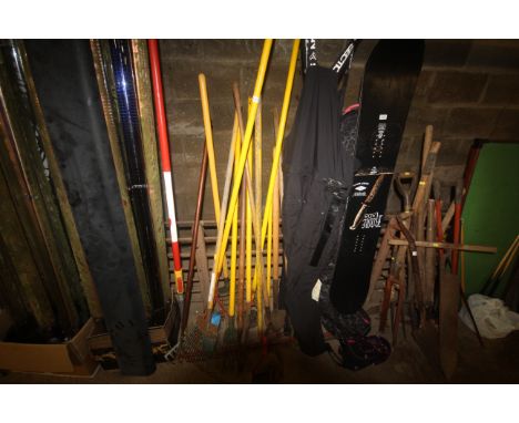 A quantity of gardening tools to include Wolf Tools rake; Wolf Tools edger; Wolf Tools cultivator etc.