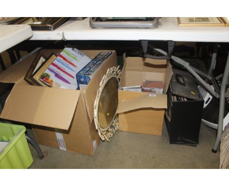 Three boxes containing CDs, records, puzzles, curtains etc.