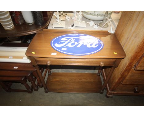 An Ercol hall table fitted single drawer 