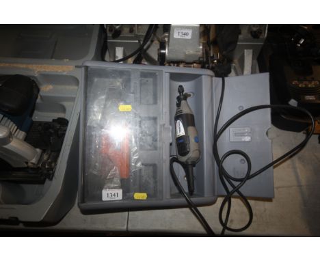 A Dremel 395 rotary tool 