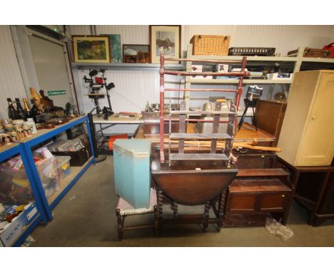 An oak gate leg table, a fire screen, a painted towel rail, two wall shelves, a loom storage basket, a stool and a quantity o
