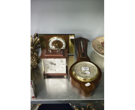 S&M ANEROID BAROMETER AND ALCOHOL THERMOMETER IN WALNUT CASE, stamped 2437, BENTIMA QUARTZ WALNUT MANTLE CLOCK AND ANOTHER, A