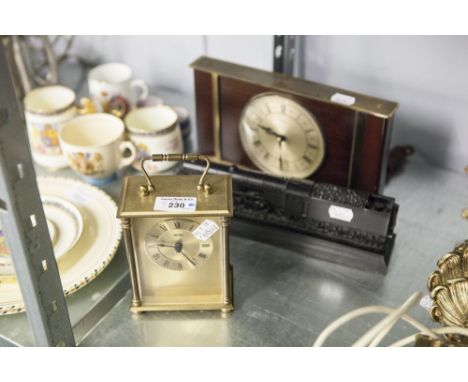 SMITHS QUARTZ CHIME GILT METAL CARRIAGE CLOCK, METAMEC MAINS ELECTRICAL MANTLE CLOCK AND A MODEL OF THE FLYING SCOTSMAN 'MADE