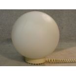 Appareil Lita, France, a vintage white frosted glass globe desk light with spiral chord. Makers