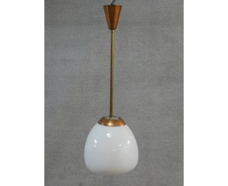 A mid century vintage copper ceiling pendant lamp with globular milk glass shade. H.83cm 