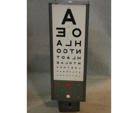 A vintage Hamblin motorised rotating optician's eye test light box. H.77 