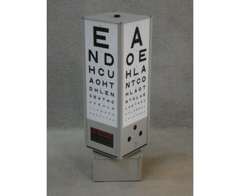 A vintage Hamblin motorised rotating optician's eye test light box. H.77 L.24 W.24cm 
