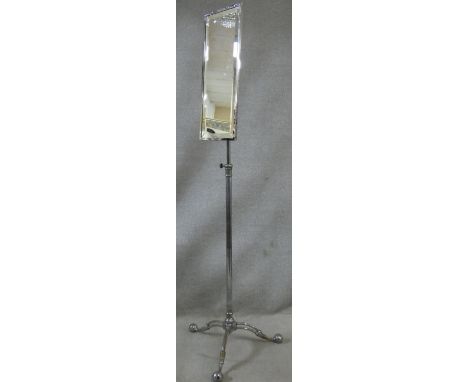 A vintage bevelled glass dressing mirror on full height adjustable chromium plated tripod stand. H.173cm 