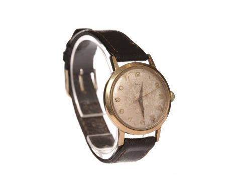 GENTLEMAN'S MID TWENTIETH CENTURY NINE CARAT GOLD MANUAL WIND WRIST WATCH
the round white dial with applied gold Arabic numer