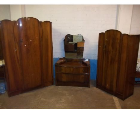 A MID CENTURY BOW FRONTED THREE PIECE BEDROOM SUITE WITH WARDROBES AND DRESSING TABLE