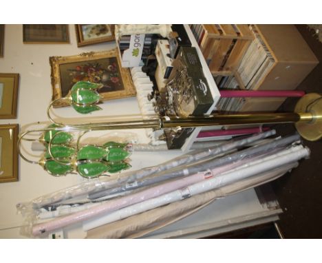 A BRASS FLOOR STANDING LAMP