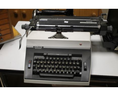 AN ADLER UNIVERSAL 390 TYPEWRITER