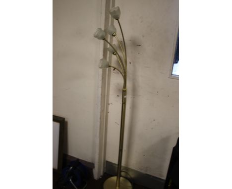 A BRASS EFFECT STANDARD LAMP