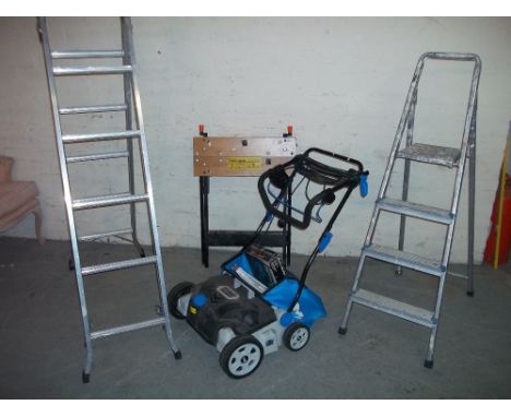 A SELECTION OF ITEMS INCLUDING TWO STEP LADDERS, A BLACK &amp; DECKER WORKMATE, A MACALLISTER ELECTRIC RAKE ETC.