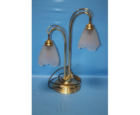 A BRASS LAMP WITH VASELINE GLASS SHADES