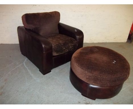 A SOFA CHAIR AND MATCHING POUFFE