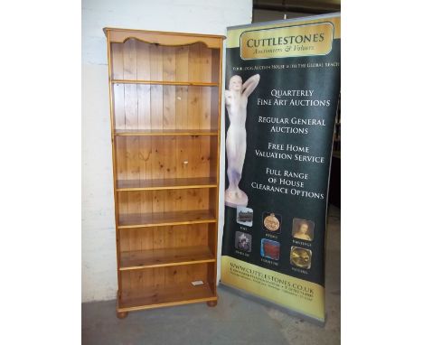 A NARROW PINE BOOK SHELF