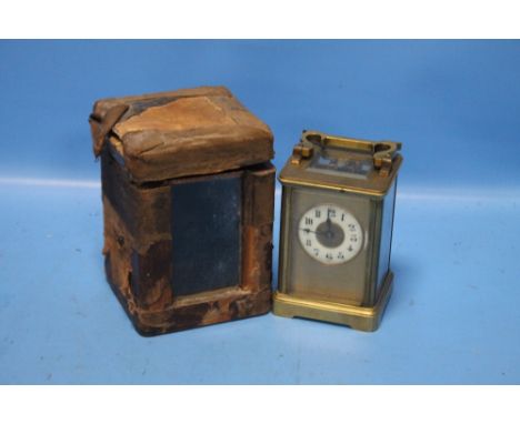 A VINTAGE BRASS CARRIAGE CLOCK IN ORIGINAL CASE, "R &amp; CO" STAMPED TO BACK,&nbsp;H 11 cm, W 7.5 cm, D 7 cm