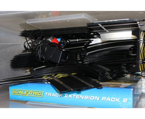 A LARGE BOX OF SCALEXTRIC 