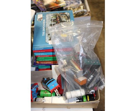 A COLLECTION OF THOMAS THE TANK ENGINE TRAIN TOYS TOGETHER WITH THOMAS THE TANK BOOKS ETC